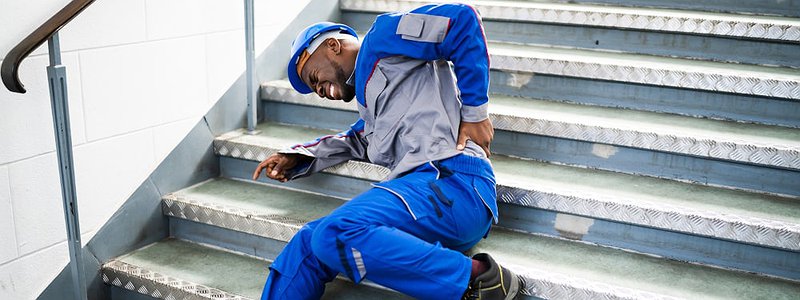 injured-man-lying-on-stairs